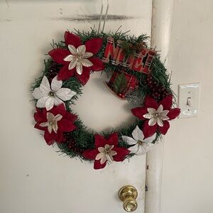 Sale on left over hand made wreaths

Holiday Wreath with Red and White Flowers